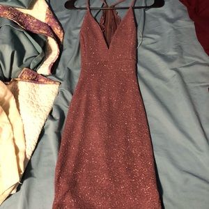 Wine color, never worn. Size Small